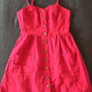 Coral dress with buttons and pockets
